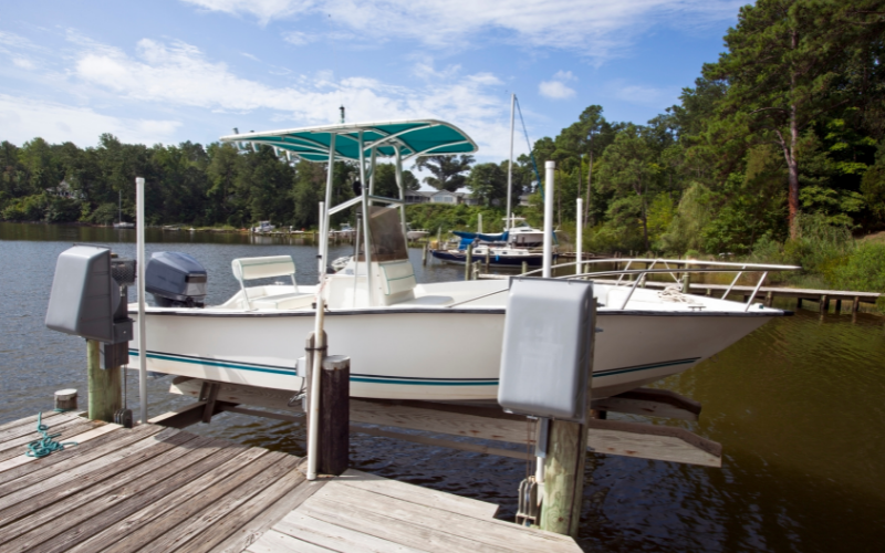 Receiving boat lift services after finishing lakefront clearing projects in Lakeland FL